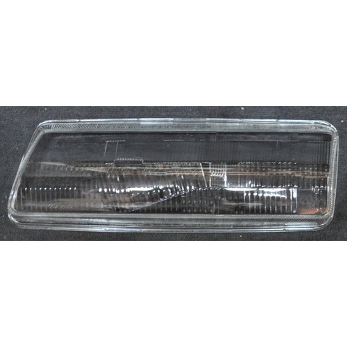 HOLDEN COMMODORE VP LEFT HEADLIGHT GLASS
