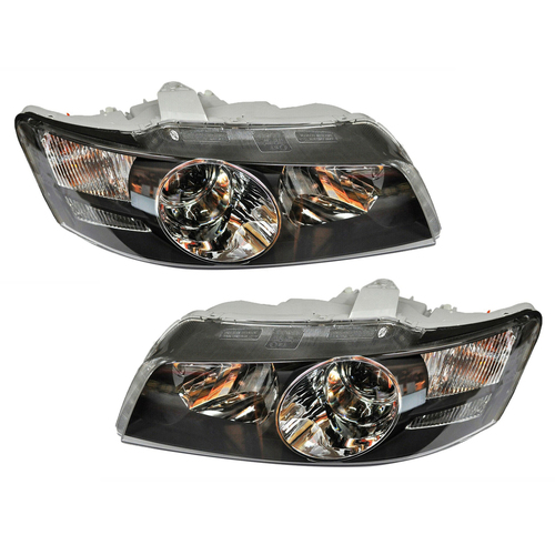 Holden WK WL Head Lights Pair Caprice Left/Right Black HSV Grange GMH NOS